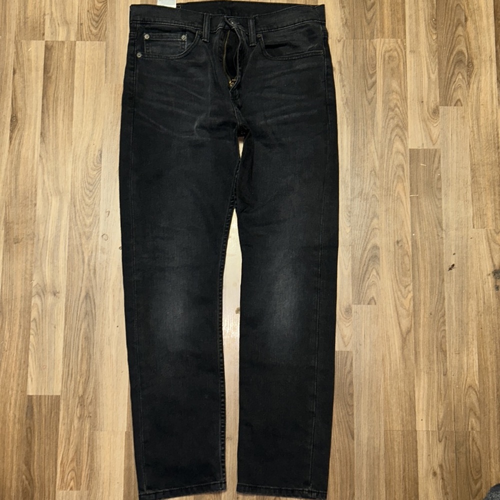 Men’s faded black 522 slim tapered fit. Size 31x30.